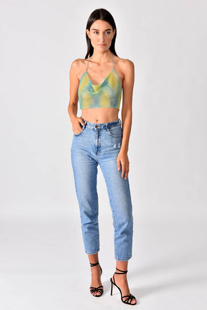 Sparkly Top Green - Model wearing shiny crop top in green-yellow gradient color, in pose for a full-body view