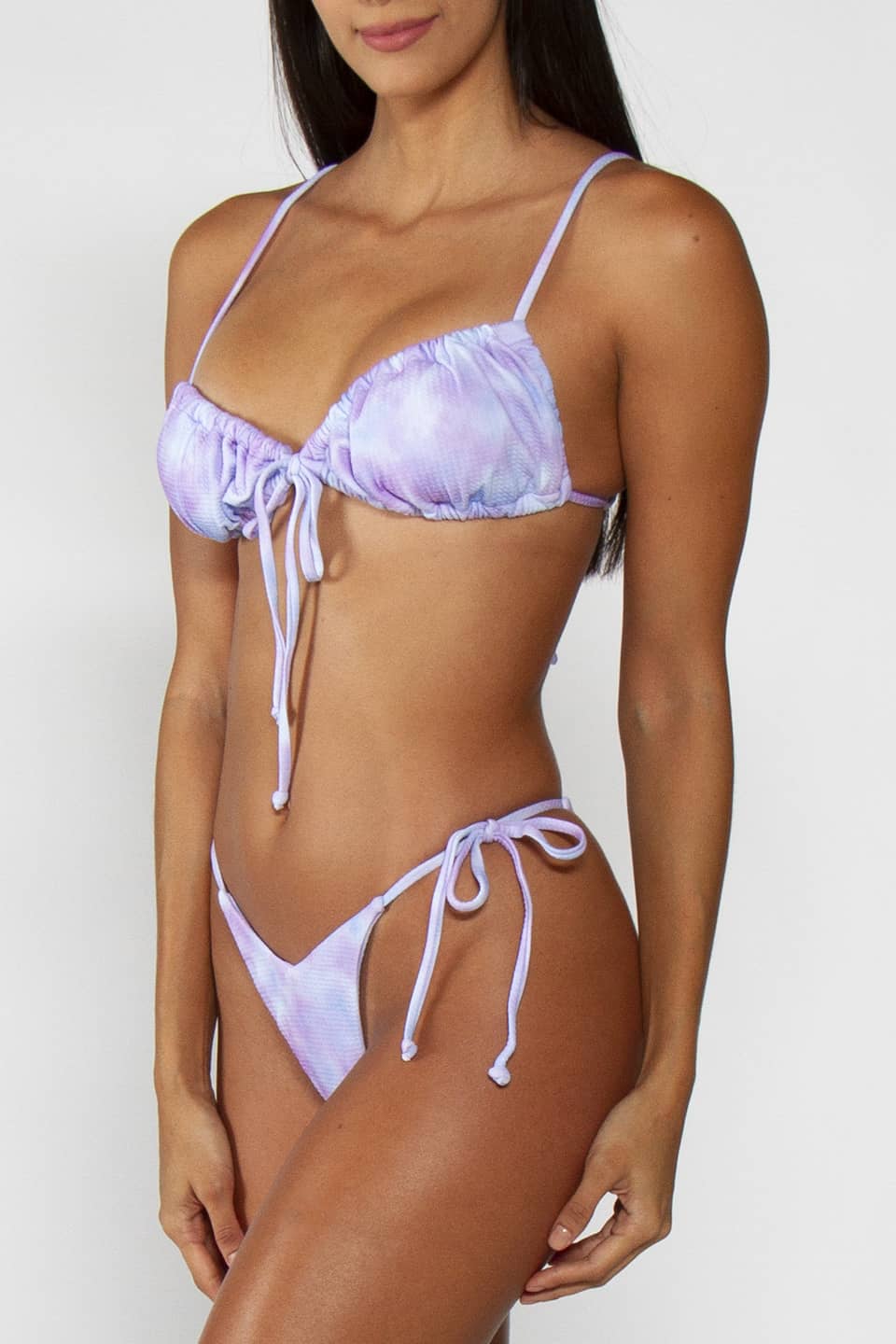 Two-piece swimwear in a mix of pastel blue and purple color, front detail