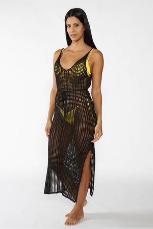 Penelope Black Beach Dress - Kaftan beach dress in black color with open back and belt around the waist. Model in natural pose