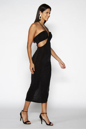 Señorita Black Dress - Model wearing stylish midi dress with high slit on the side in black color, in walking pose