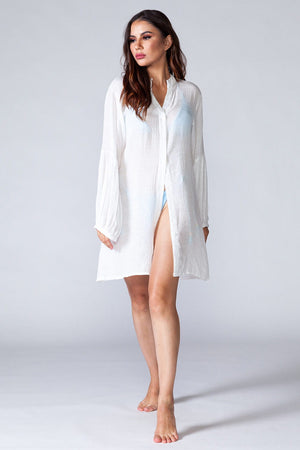 Wanderlust Shirt Dress - Model wearing long sleeved beach shirt kaftan style, in walking pose