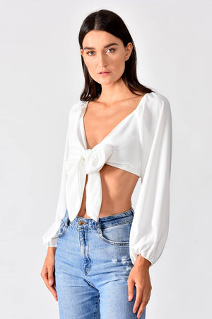 Romantic Top White - Model in front pose, while wearing trendy crop top in white color