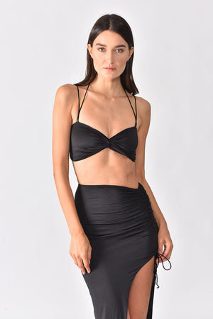 Black Goddess Set - Woman wearing Stretchable skirt and top in Black color, in frontal pose, half body