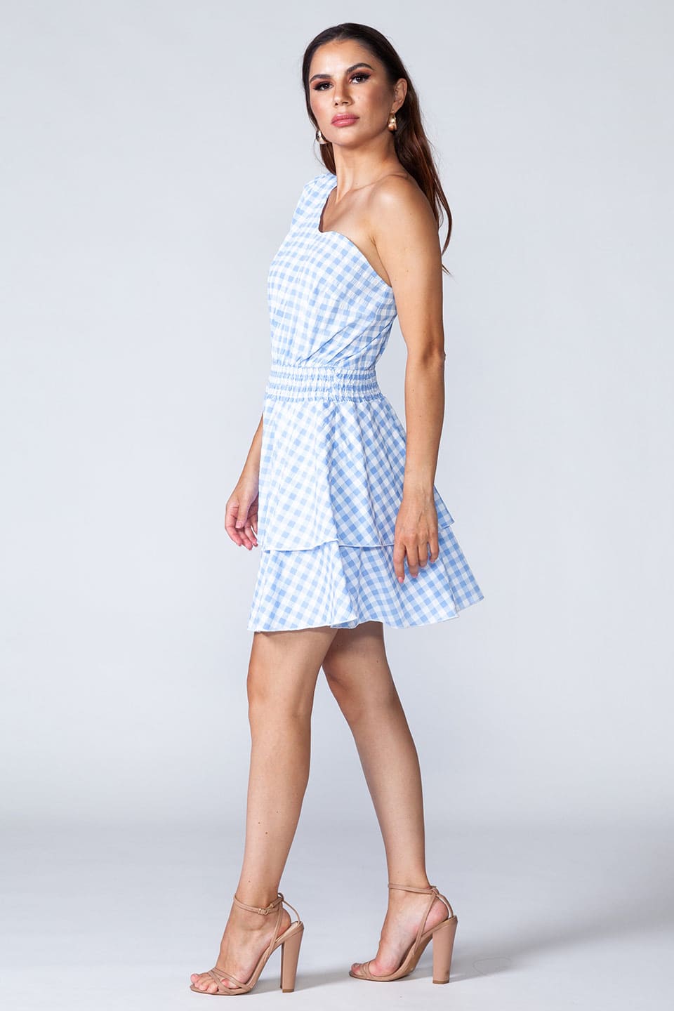 Blue flamenco, one shoulder mini dress in light blue and white, model walking