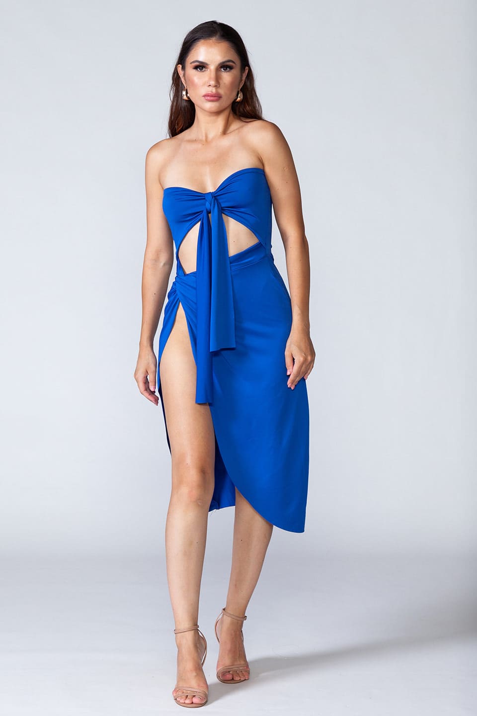 Trendy blue mini dress with overlapping skirt, model posing for front view