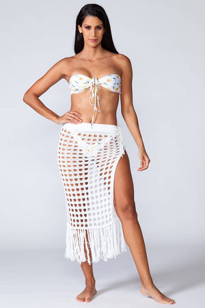 Caliope Beach Skirt - White midi beach skirt with long fringes, model posing in front view
