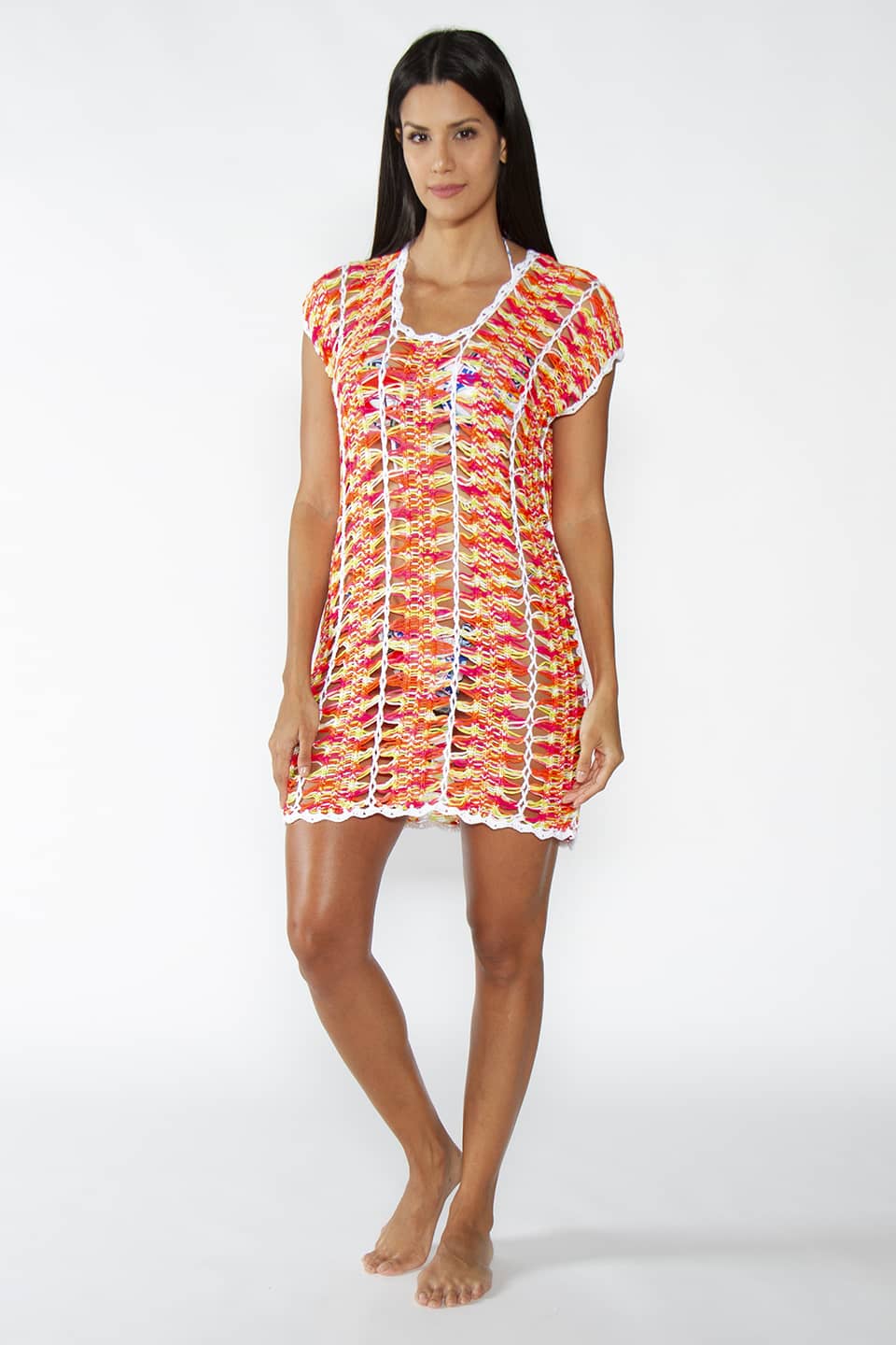 Crochet kaftan in neon colors, model posing full body