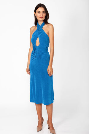Marylin Dress - Model wearing stretchable midi dress in blue color with open back. Front view