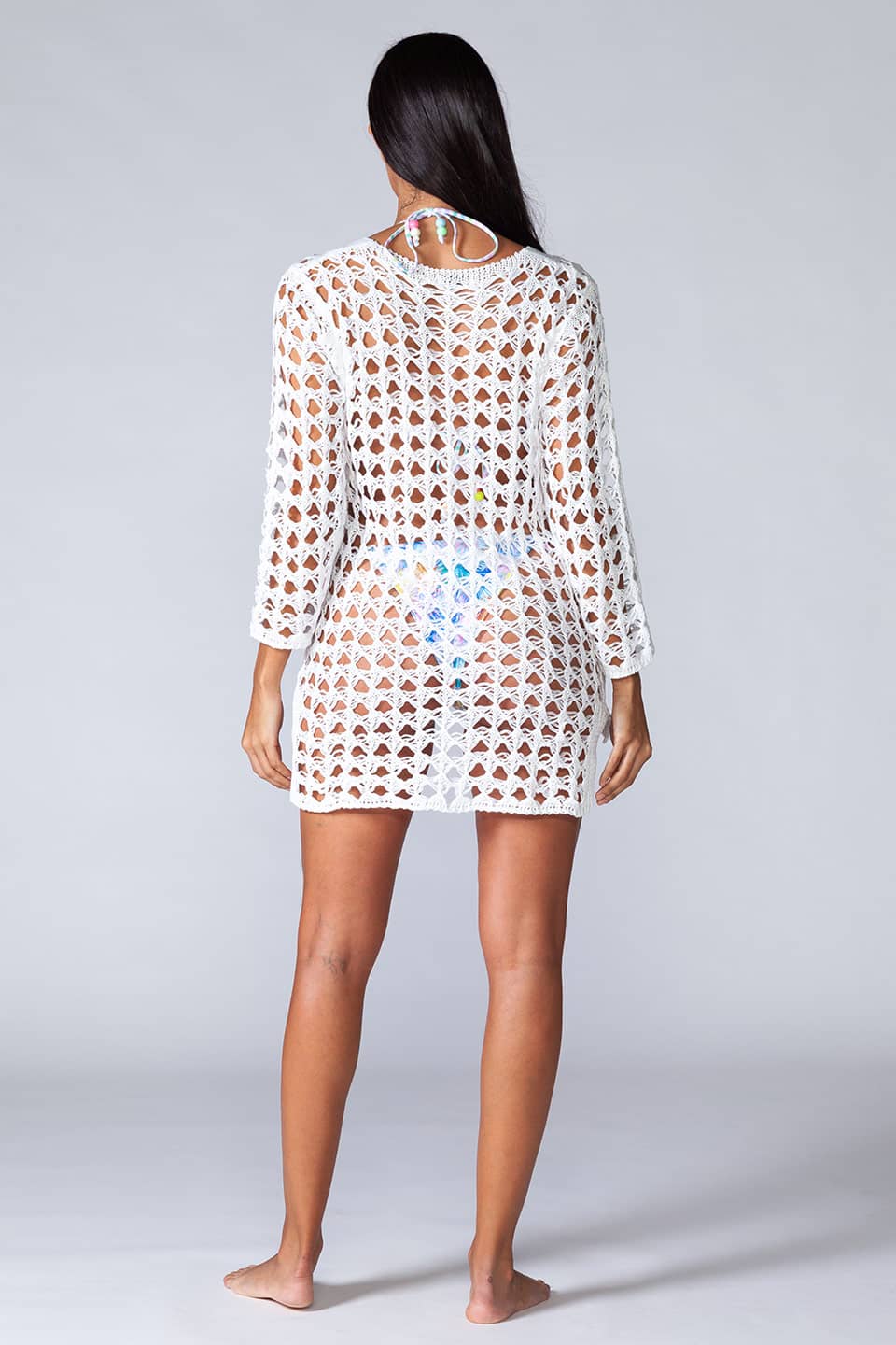 Long sleeved mini beach dress kaftan. Model from behind