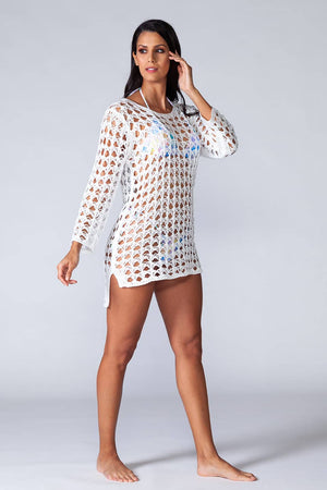Nika Beach Dress - Long sleeved mini beach dress kaftan. model posing in movement