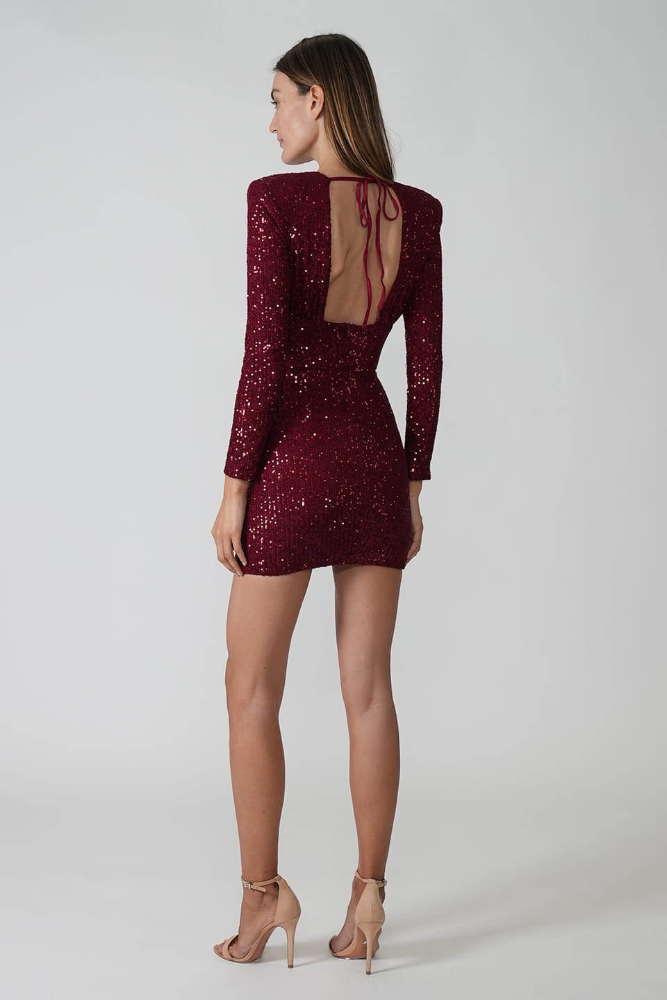 Special occasions short dress in ruby color with shiny sequins and long sleeves