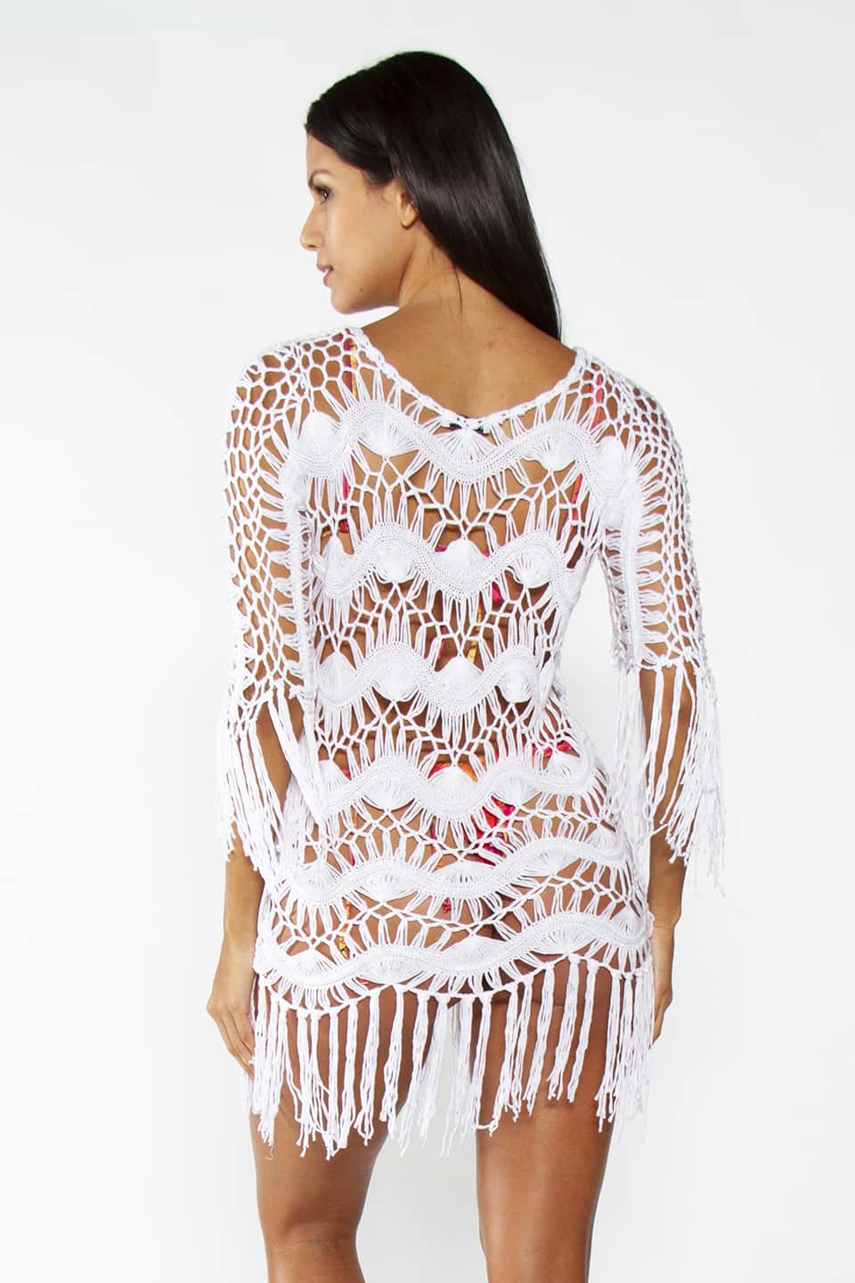 Model wearing Crochet Bohemian Cover up with fringe in White color, posing from behind