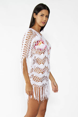 Tropico Beach Dress White - Model wearing Crochet Bohemian Cover up with fringe in White color, posing for side view
