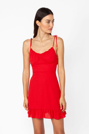 Valentine dress - Model wears short dress in red color and adjustable self-tie straps, posing for front view