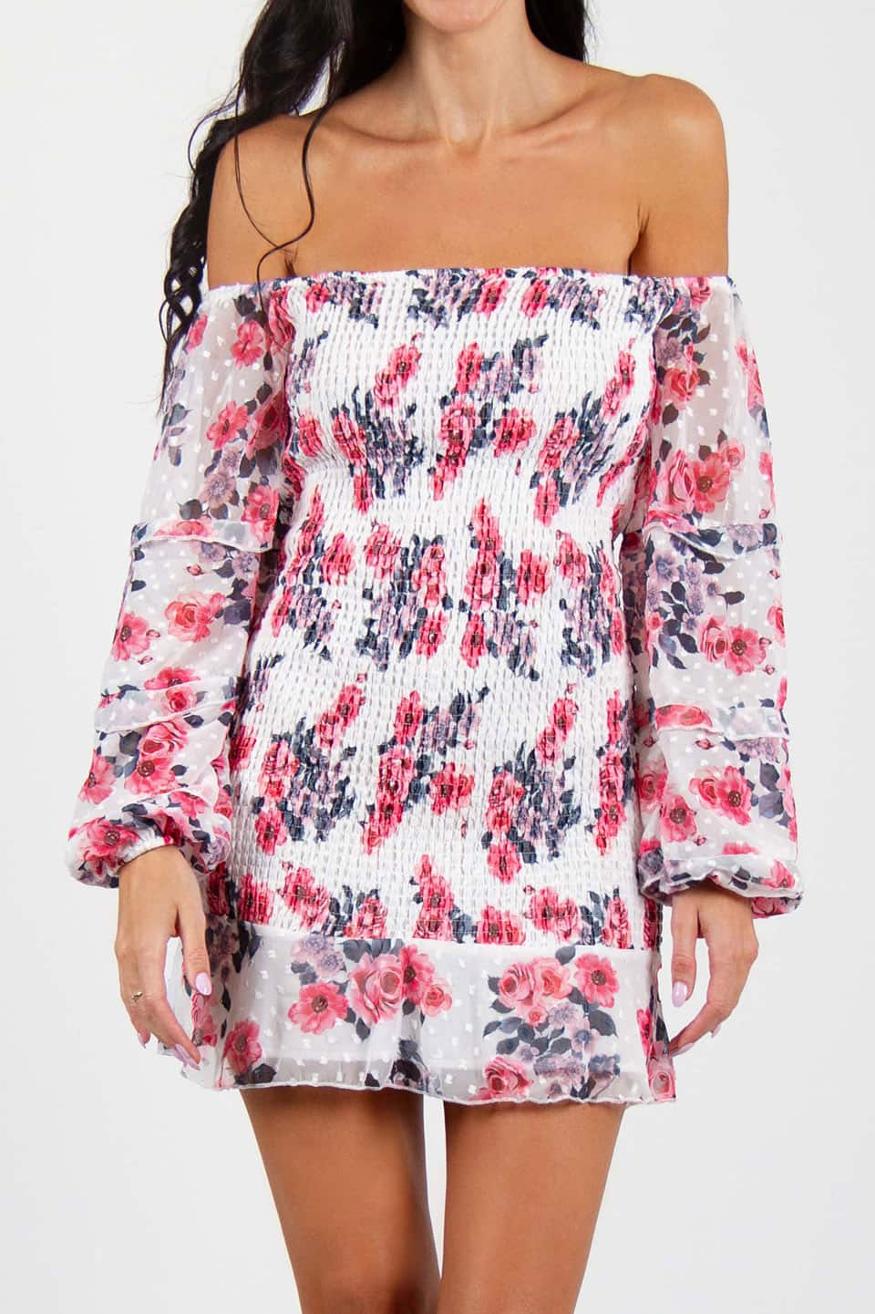 Model wearing off-shoulder floral print bodycon mini dress with long puff sleeves, front details