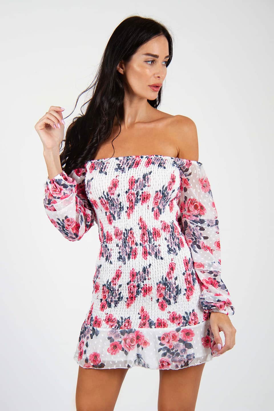 Model wearing off-shoulder floral print bodycon mini dress with long puff sleeves, posing in front view